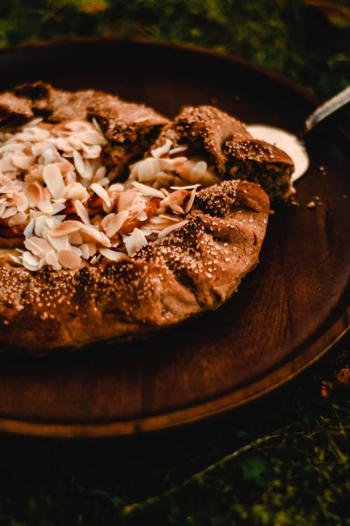 Brown and White Pastry on Brown Wooden Round Plate