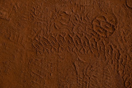 Traces in the Clay of Tennis Court