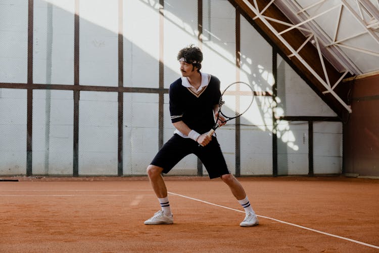 A Man Playing Tennis