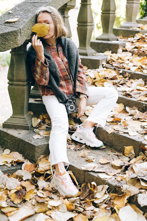 A Woman Sitting on the Stairs