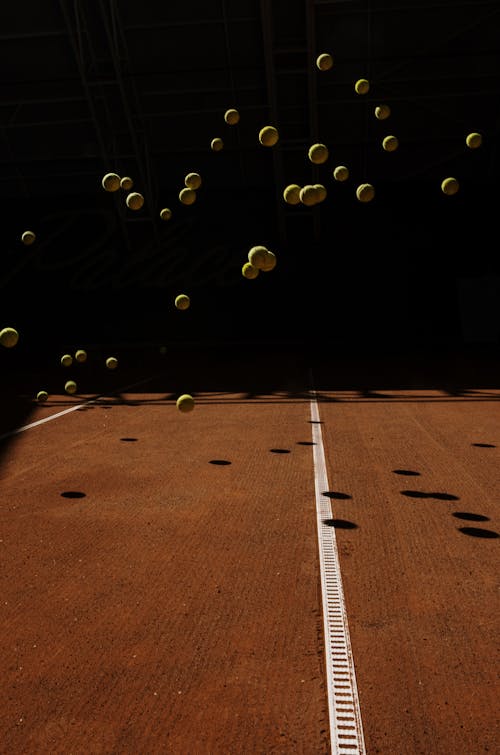 Foto profissional grátis de bolas de tênis, luz e sombra, movimento