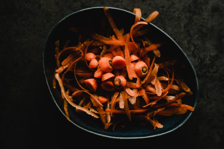 Carrots Peeling In A Bowl