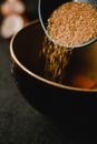 Brown Liquid in Black Ceramic Bowl