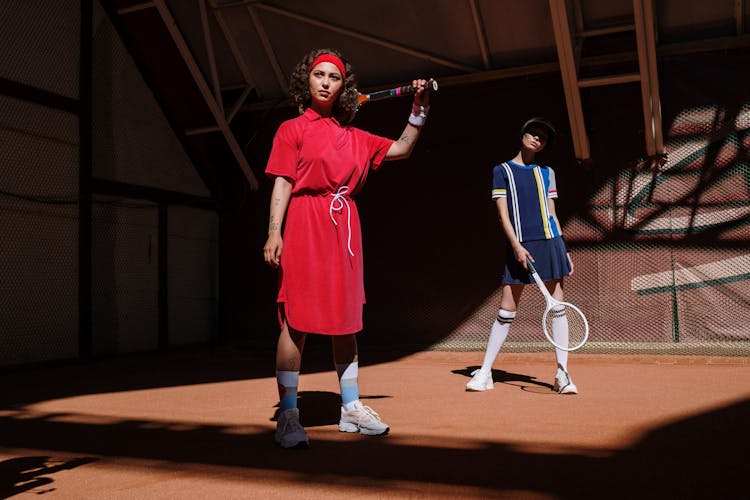 Women Holding Their Tennis Rackets