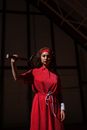 Woman in Red Dress Singing