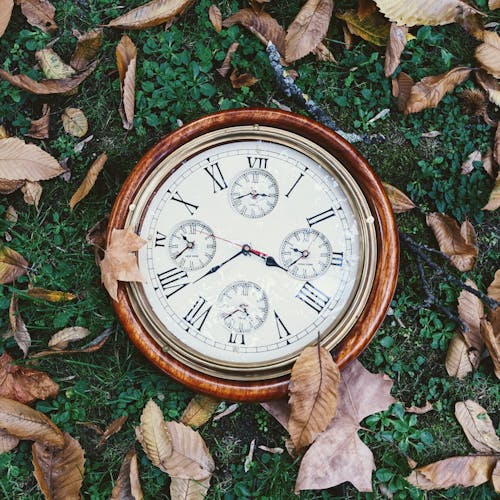Free A Round Wooden Clock Stock Photo