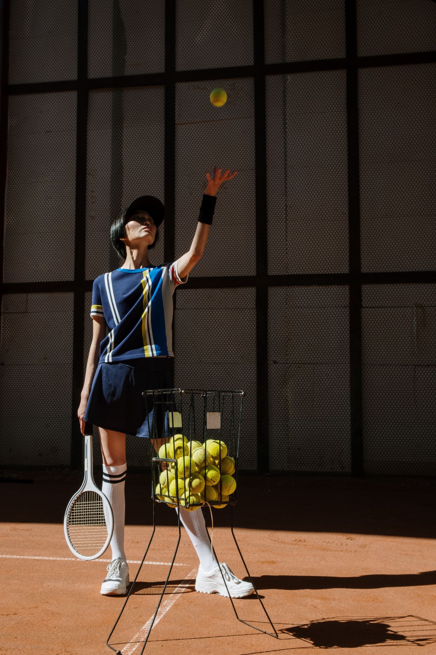 Tennis player portrait holding a racket