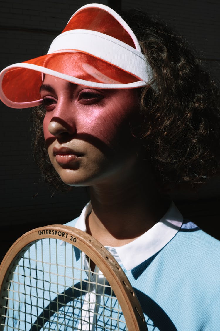 A Woman Wearing Sun Visor Cap