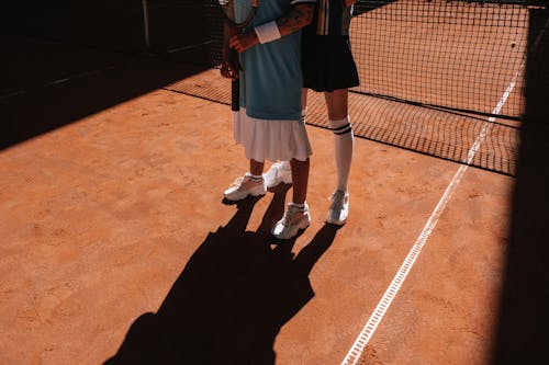 Tennis Players on the Tennis Court