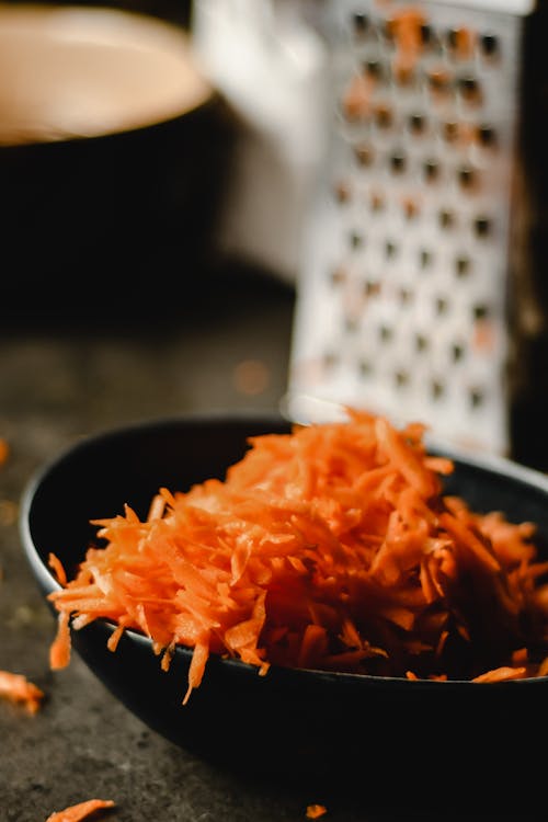 grated carrots in a bowl A Bowl of Grated Carrots