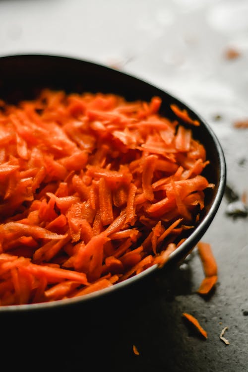 Fresh carrot prepared for cooking in pan
