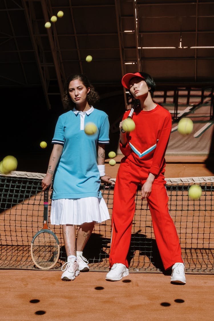 Athletes With Tennis Rackets Posing