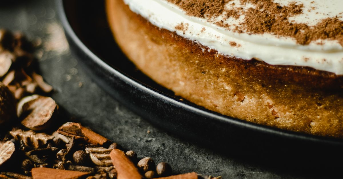 Powder Toppings Cinnamon Powder Toppings on a Cake with Icing · Free Stock Photo