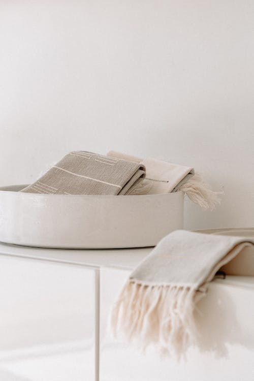 Linen and Cotton Table Runners Lying on Furniture