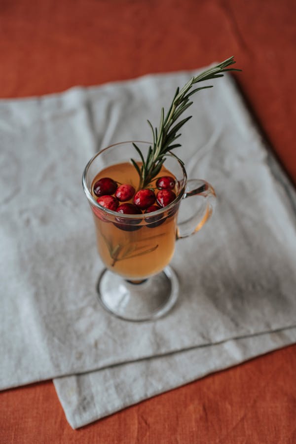 Clear Glass Mug With Red and Yellow Liquid