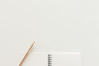 Notepad and pencil — photo by Tirachard Kumtanom on Pexels