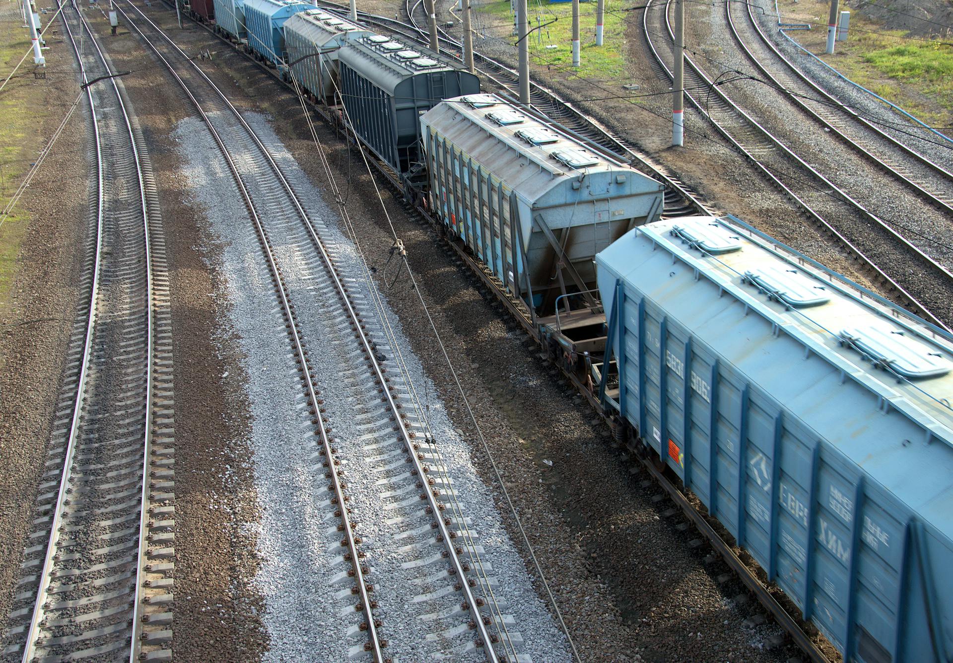 Aerial View on Cargo Train and Railroad Tracks