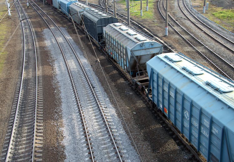 Aerial View On Cargo Train And Railroad Tracks 