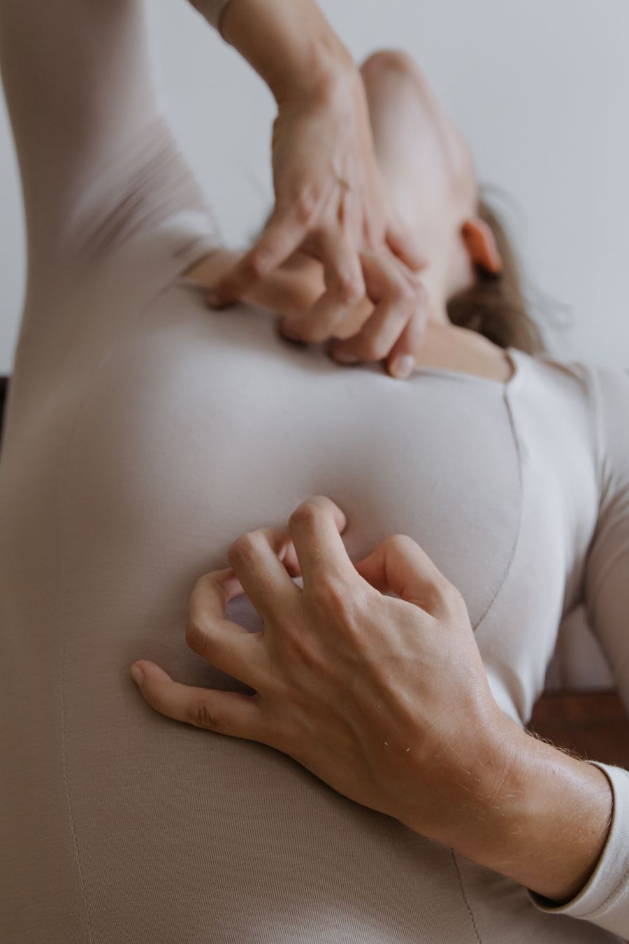 Woman scratching itchy sensitive skin