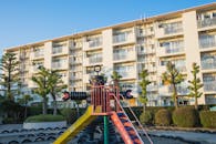 Playground with slide and rubber robot