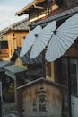 Authentic umbrellas decorating oriental rural building