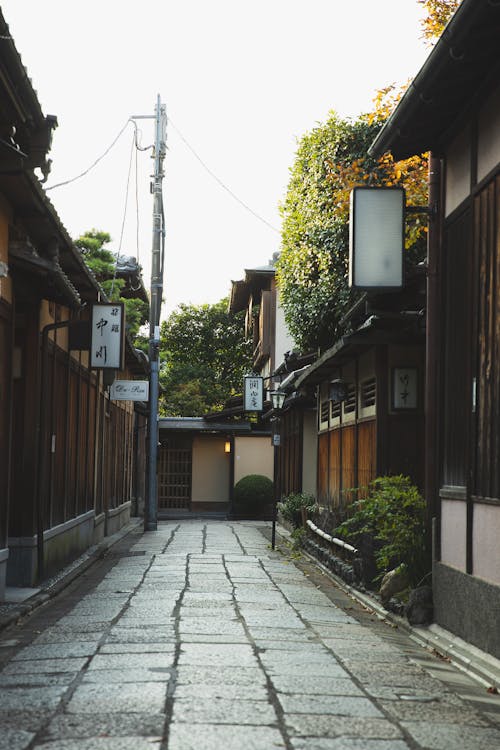 Narrow alley with small traditional wooden houses in Japan