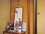 Traditional Japanese souvenirs placed on wooden table