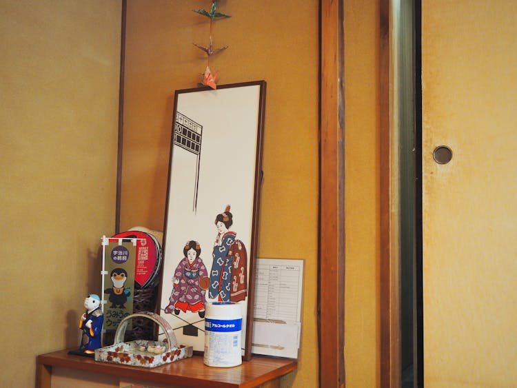 Traditional Japanese Souvenirs Placed On Wooden Table