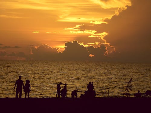 Бесплатное стоковое фото с вечернее солнце, закат, солнечный лучик