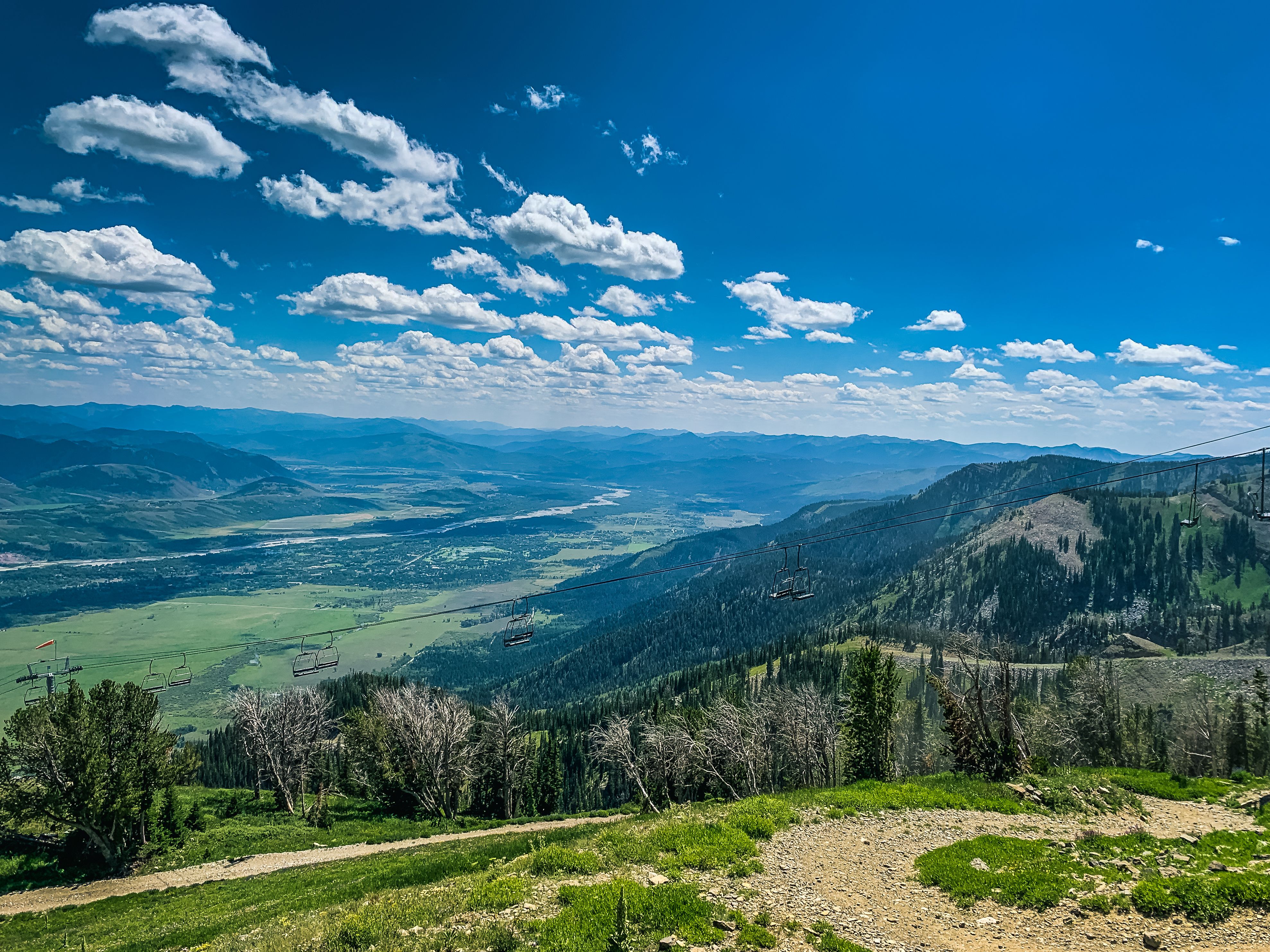 Valley With Ridges Mountain ridge with green plants in valley · Free Stock Photo