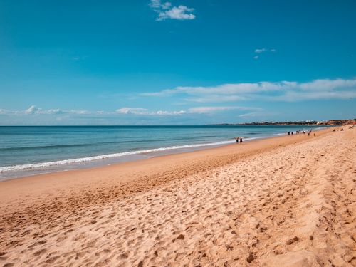 Free Beautiful sunny day at Albufeira beach, Portugal, with clear blue skies and soft sand. Stock Photo