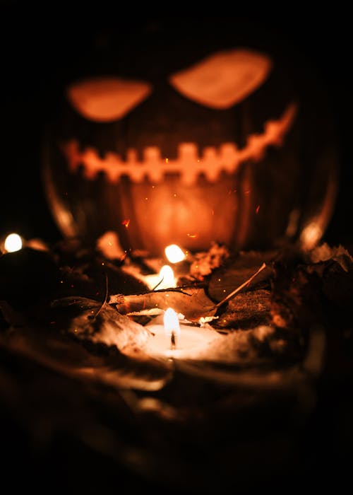 Jack O Lantern With Lighted Candles