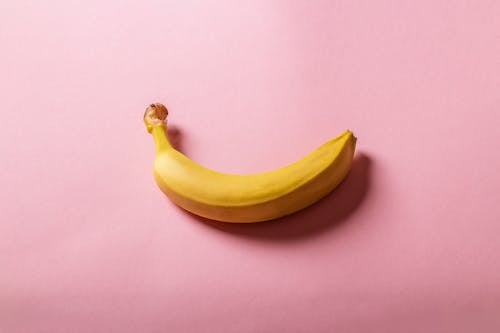 Banana on Pink Surface