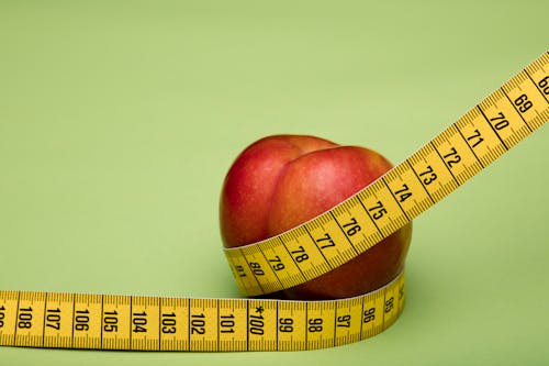 Free Measuring an Apple Stock Photo