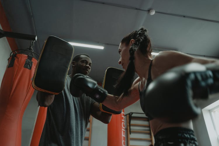 Woman Punching A Focus Mitt