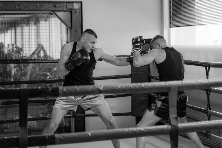 Two Men Boxing Together 