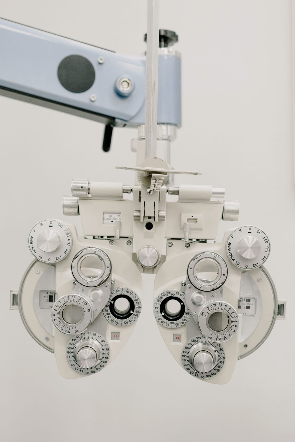 Phoropter for on-site eye exams at Aura Optical