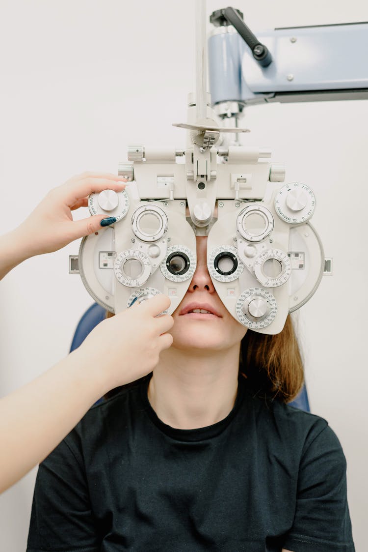 Crop Doctor Examining Vision Of Patient