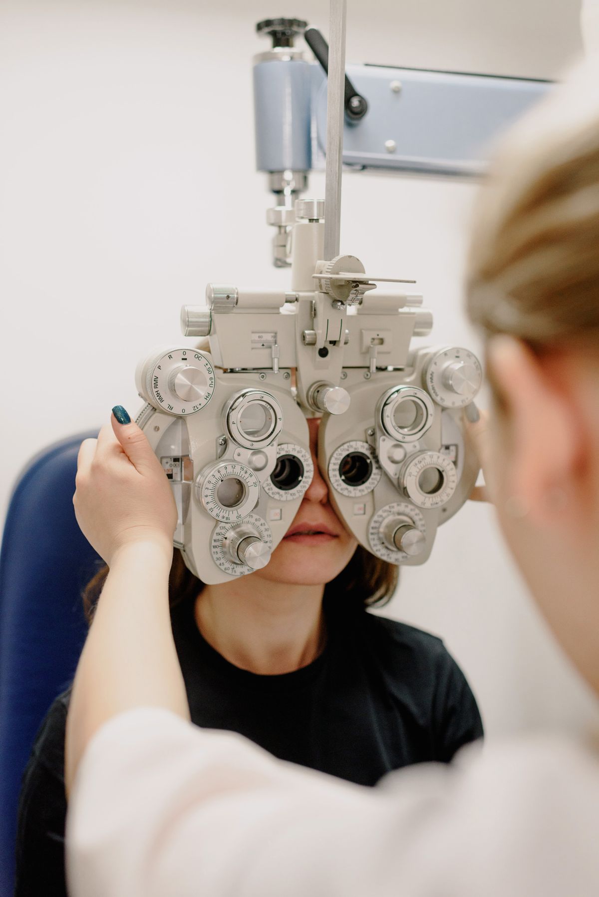 Ophthalmology clinician conducting a vision check-up with a patient (stock photo, placeholder)