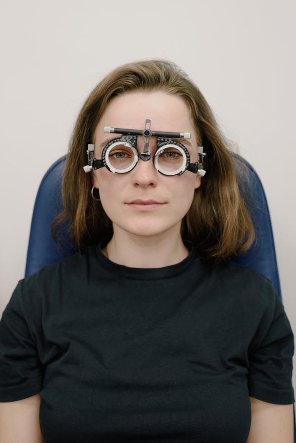 Woman with corrective lenses in clinic