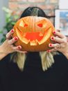 Person Holding Jack O Lantern