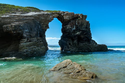 Kostnadsfri bild av 4k tapeter, hav, klippa stenar