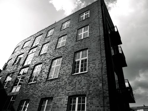 Grayscale Photography of Brick Building