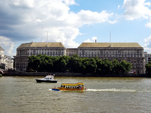 Boats Sailing Near Building