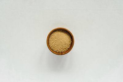 Sesame seeds in wooden bowl