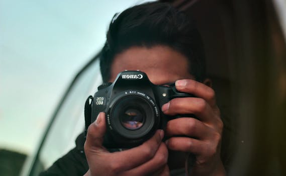 Woman Holding Black Dslr Camera · Free Stock Photo