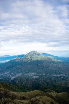 Dormant volcano with vegetation in mountains