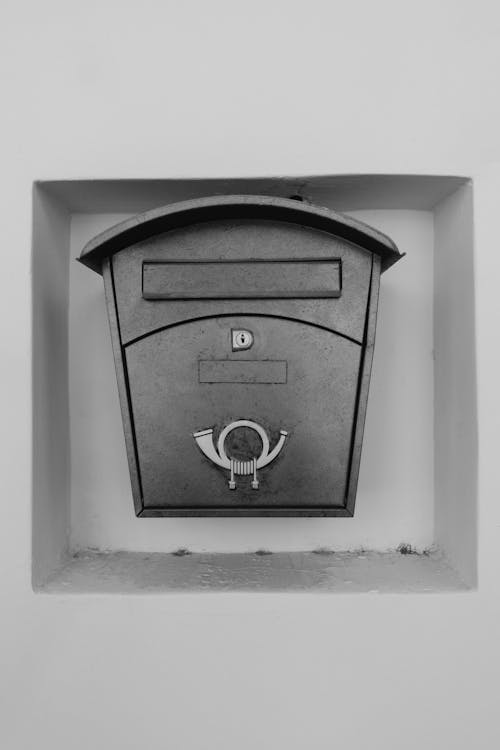 Free A Mailbox Mounted on the Wall Stock Photo