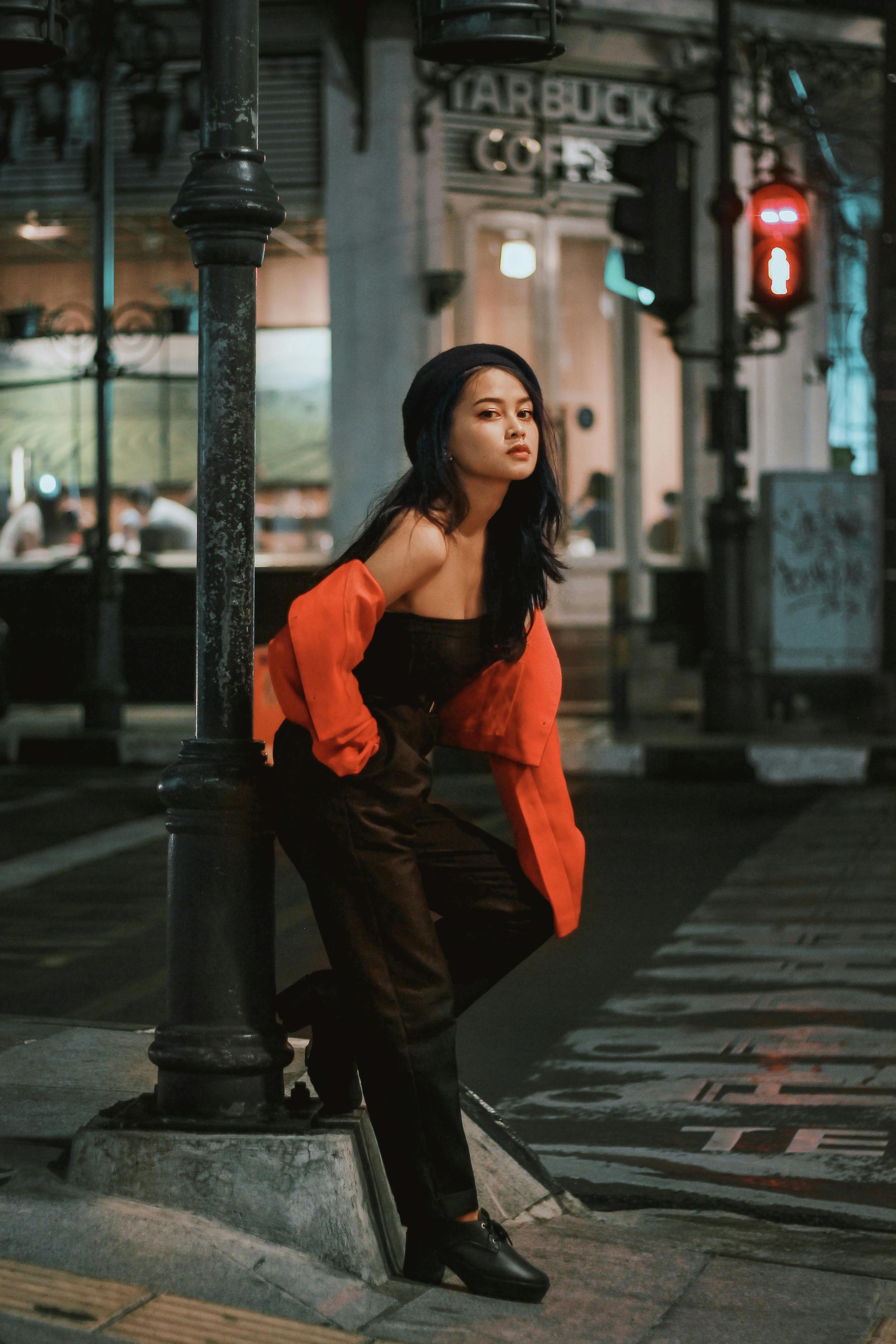 Lifestyle fashion in New York, a stylish asian woman in a grey dress, red  bag on Madison Avenue, traffic and street steam in background Stock Photo -  Alamy