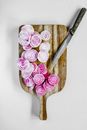 Slices of Beetroots over a Wooden Chopping Board